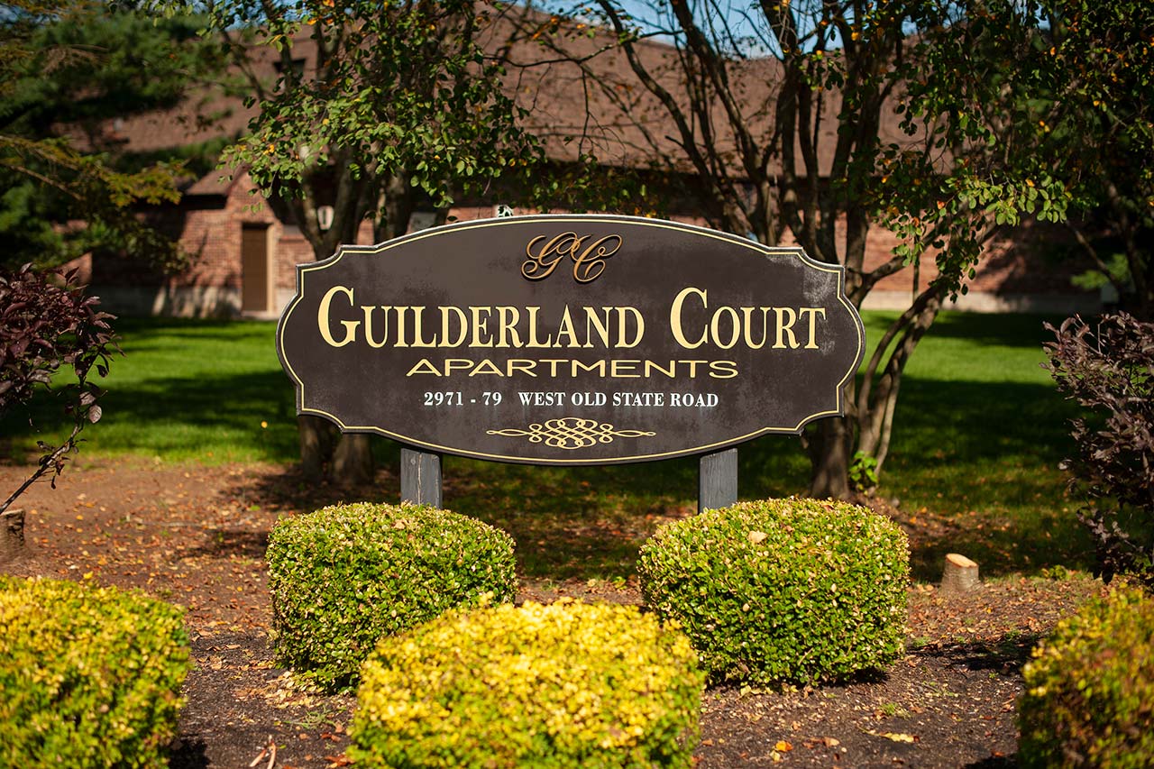 Guilderland Court Apartments exterior sign, day